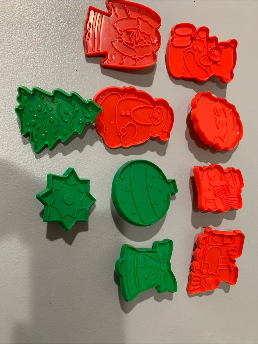 Clear Plastic Jar with Red and Green Holiday Game Pieces